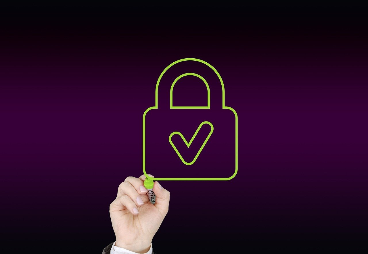 A broken padlock next to a strong, secure shield symbol